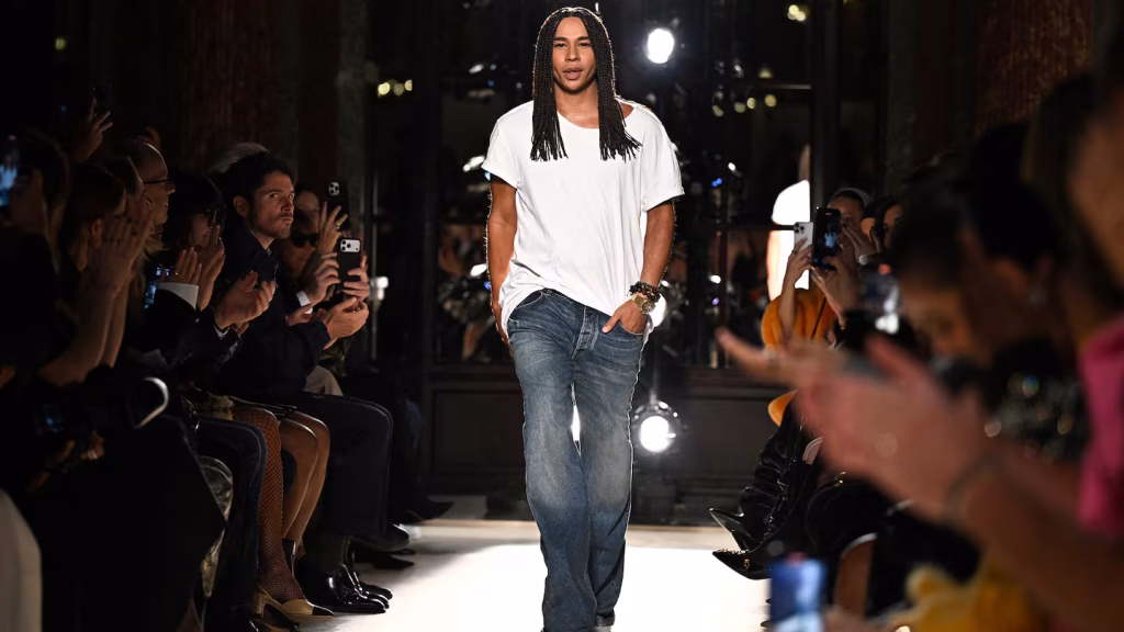 Olivier Rousteing at Balmain runway finale, Paris Fashion Week.
