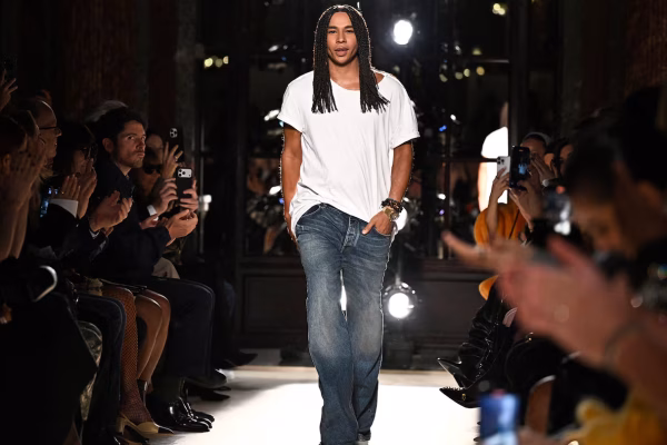 Olivier Rousteing at Balmain runway finale, Paris Fashion Week.