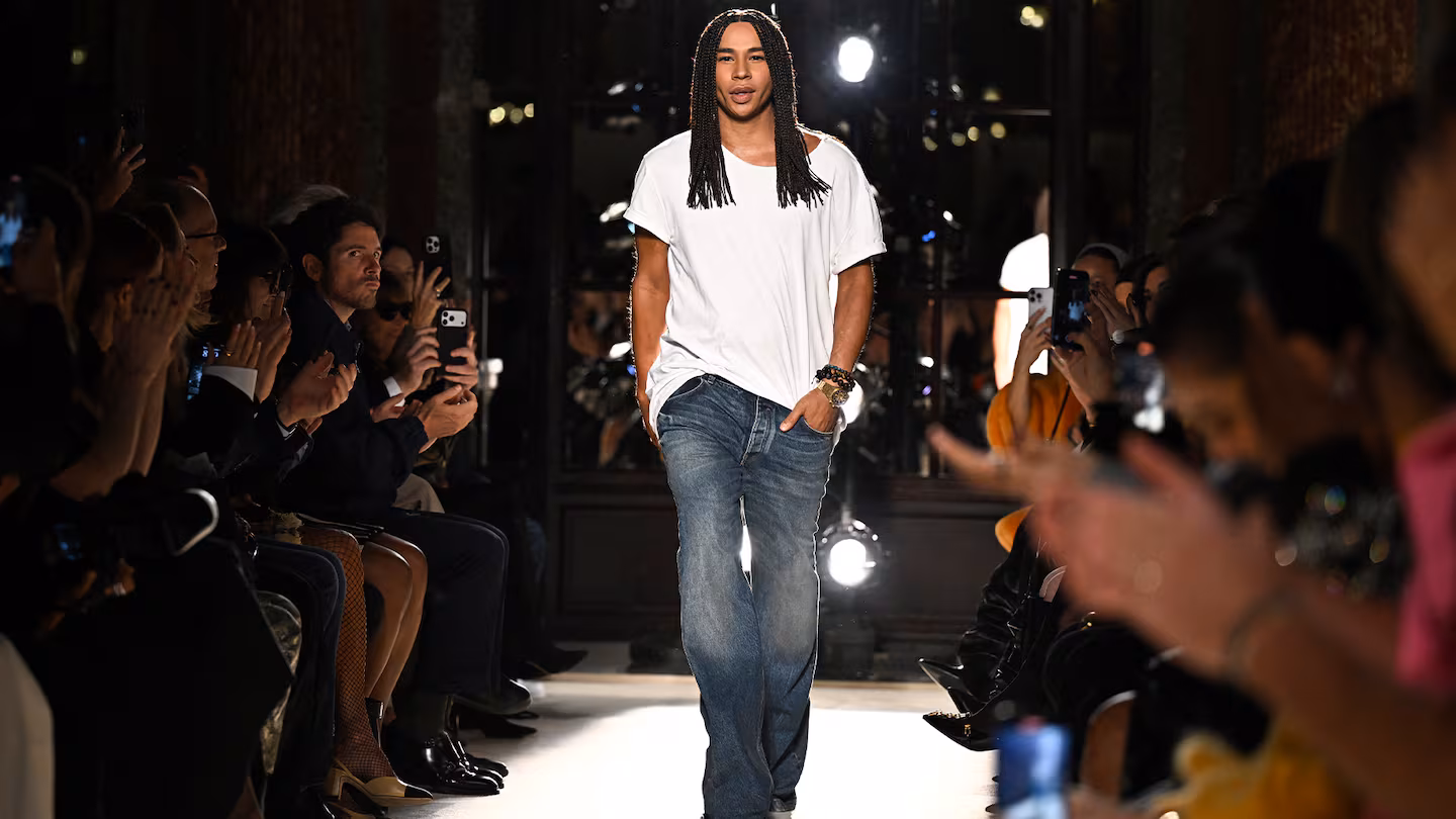 Olivier Rousteing at Balmain runway finale, Paris Fashion Week.